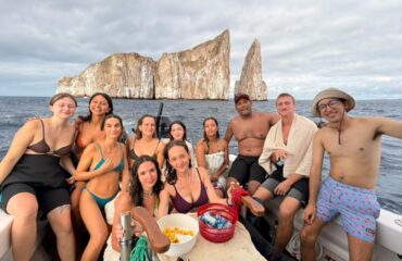 Speedboat navigation along the scenic coastline of San Cristobal Island on a 360 tour.